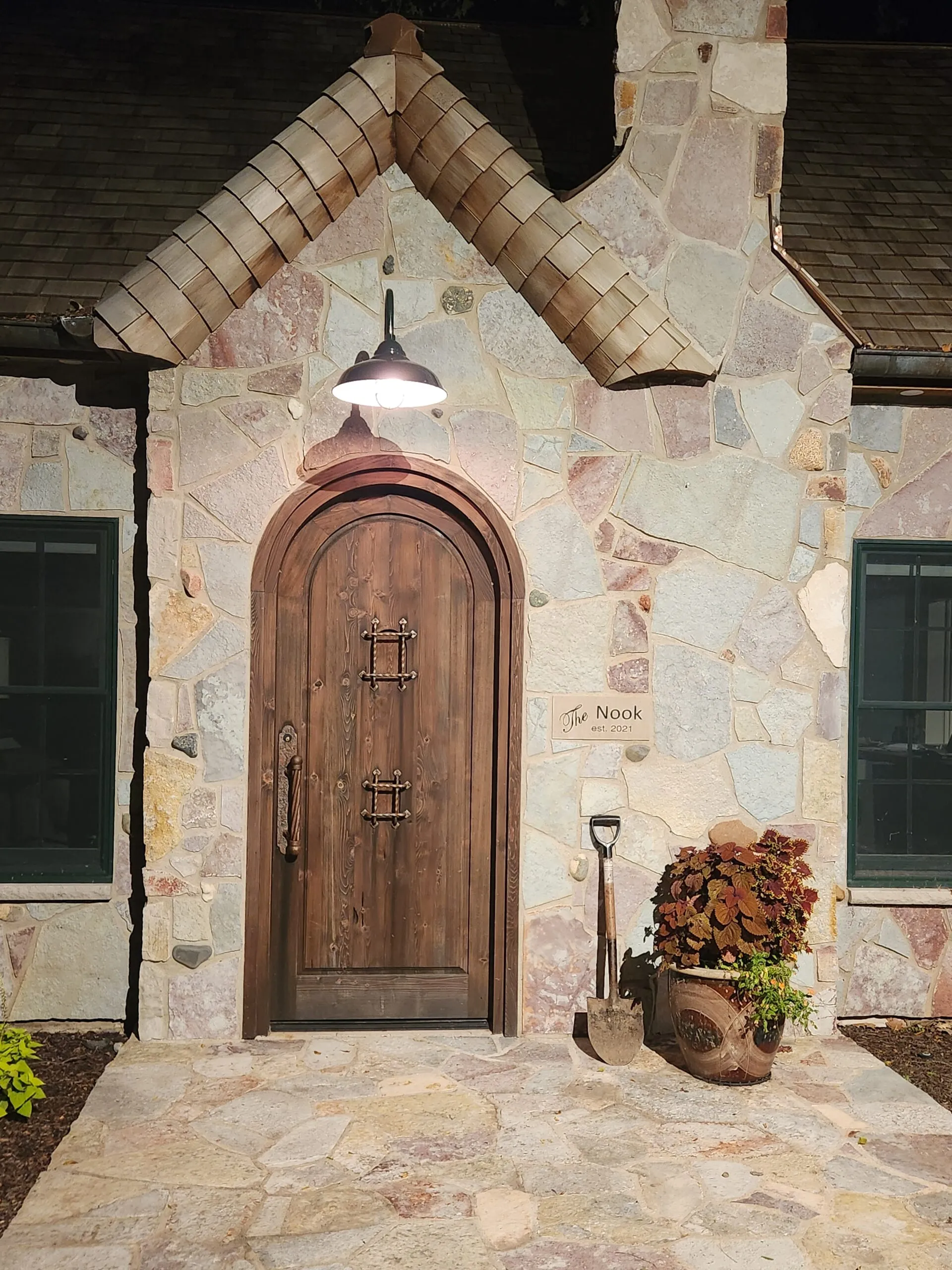 Front-door-at-night-with-shovel-20230820